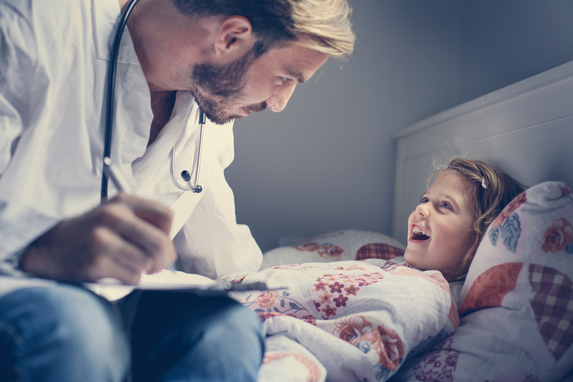 Doctor at Home with Daughter | Innova Emergency Medical Associates
